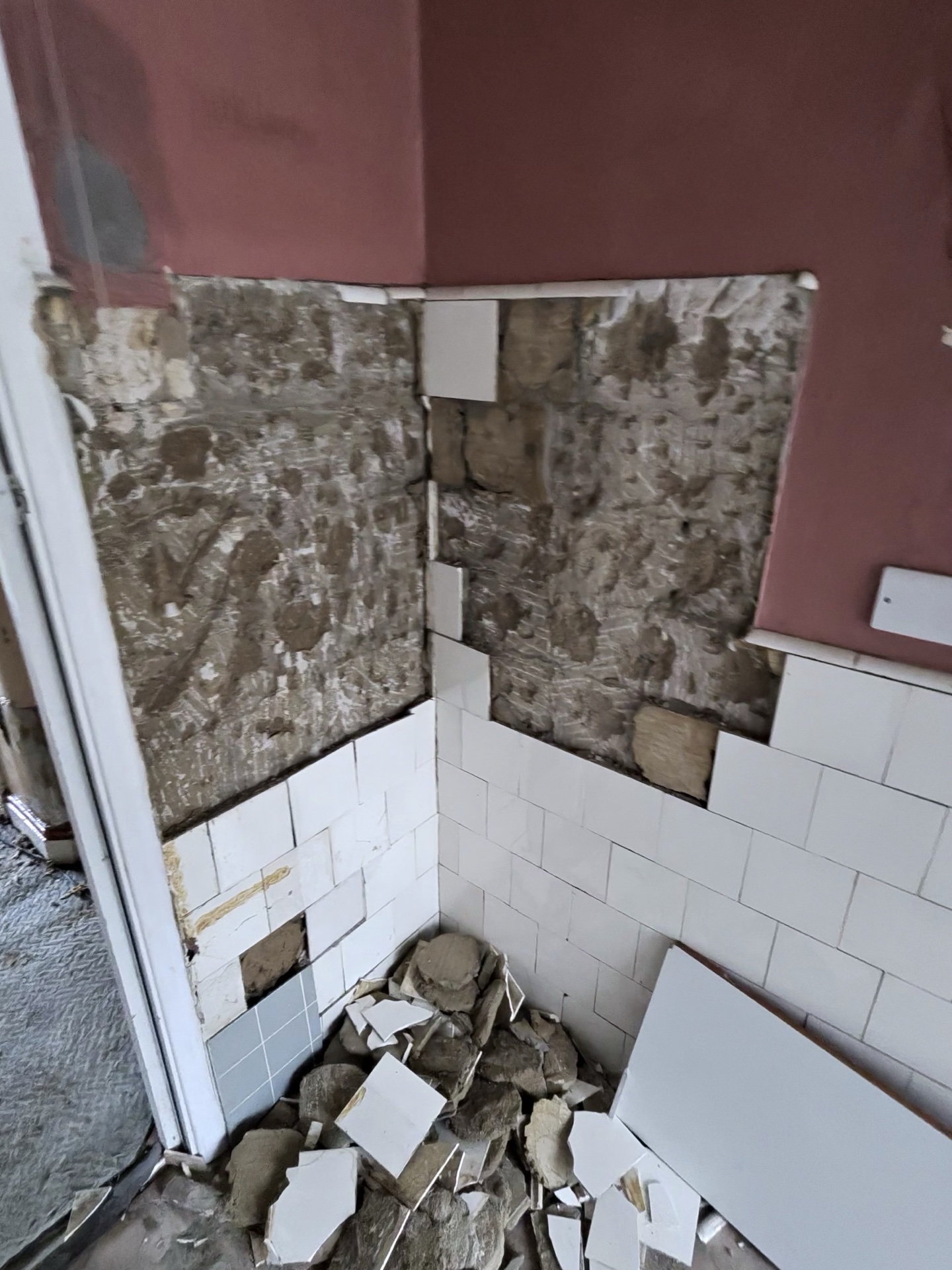 Tile and substrate removal – raw brickwork uncovered
